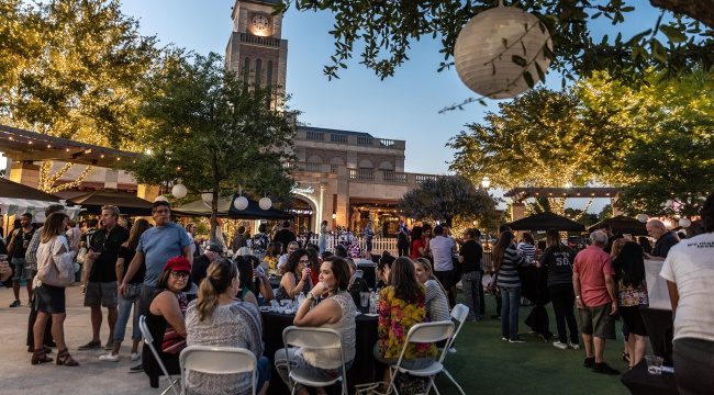 Outdoor festival with large groups of people