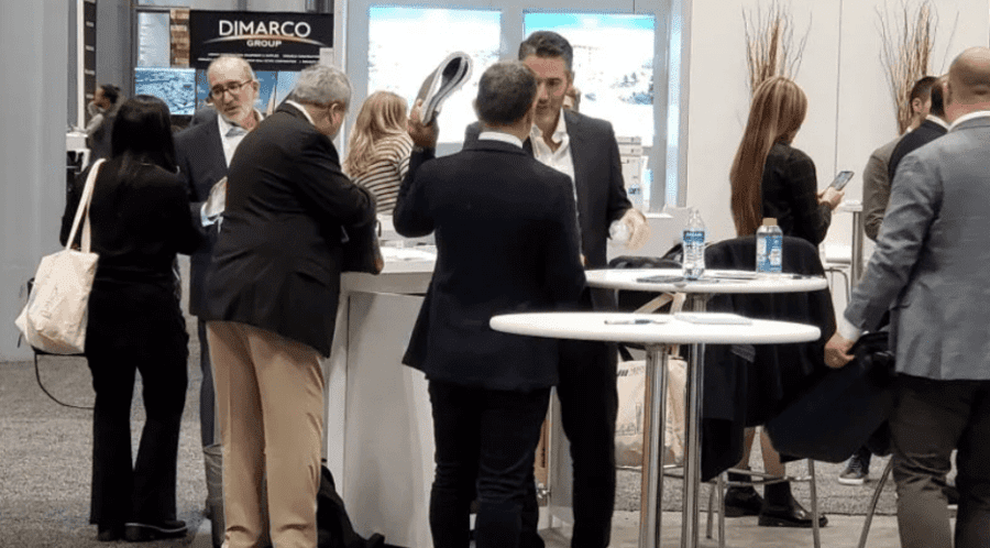 Poag Development Group team engaging with industry professionals about Mixed-Use Retail Development projects at ICSC New York City event booth.